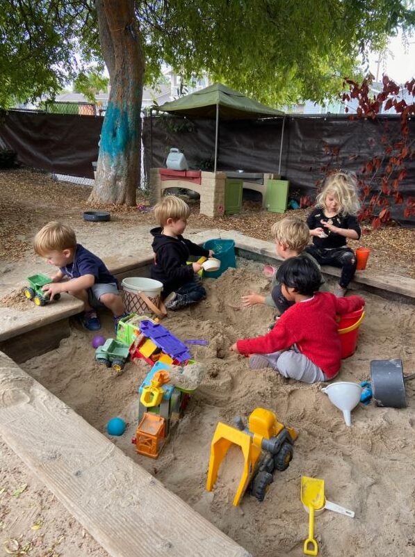 Children playing together in the sandbox