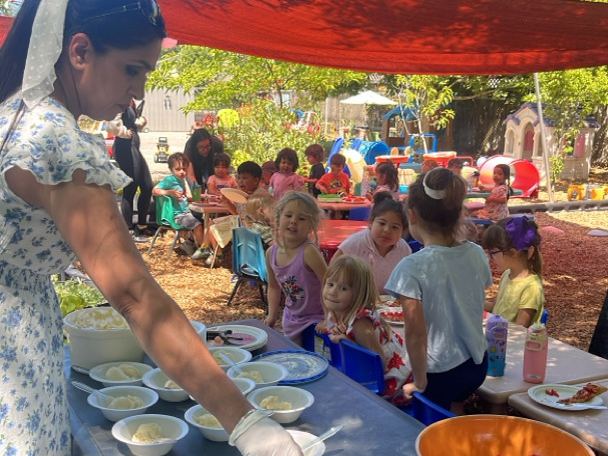 ECLA families gathering outdoors