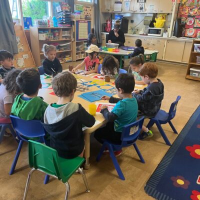Children working on table activities in the classroom